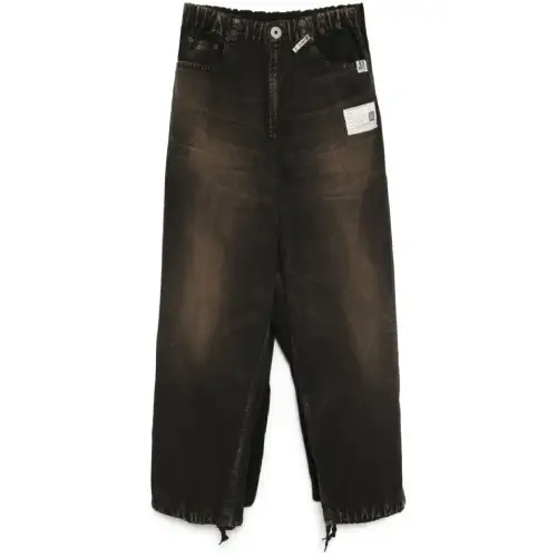 Front view of Maison Mihara Yasuhiro Double Layer Black Pants with layered construction