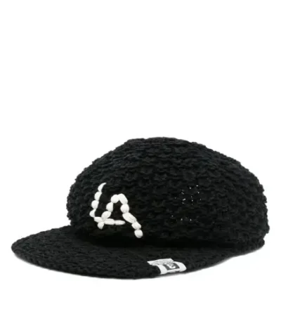 Front view of Maison Mihara Yasuhiro LA Embroidered Hat with premium stitched logo