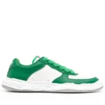 Front perspective of Maison Mihara Yasuhiro Low-Top Panelled Sneakers featuring layered leather and suede panels