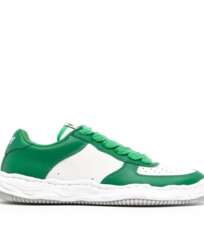 Front perspective of Maison Mihara Yasuhiro Low-Top Panelled Sneakers featuring layered leather and suede panels