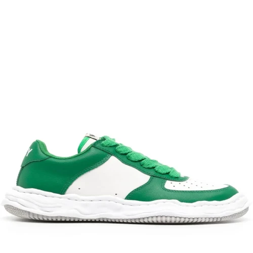Front perspective of Maison Mihara Yasuhiro Low-Top Panelled Sneakers featuring layered leather and suede panels