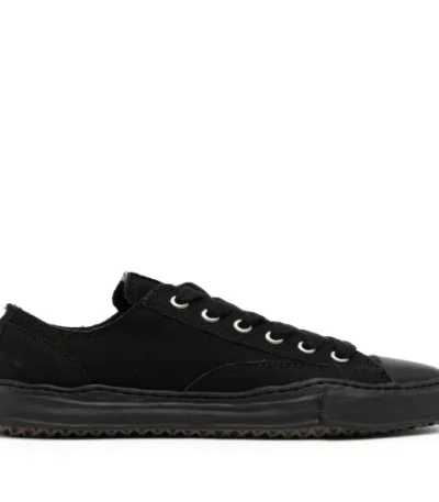 Front perspective of Maison Mihara Yasuhiro Peterson OG Sole Canvas Black Sneaker featuring sculpted rubber sole