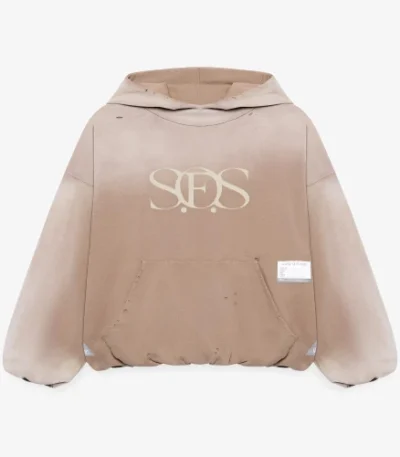 Front view of Maison Mihara Yasuhiro S.O.S Sun Faded Like Beige Hoodie
