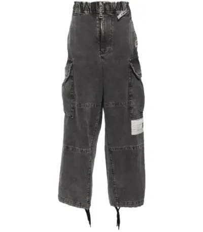 Front view of Maison Mihara Yasuhiro Sewn Military Trousers with utility pocket design
