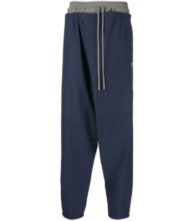 Front view of Maison Mihara Yasuhiro Straight-Leg Track Pants with relaxed fit