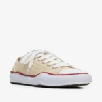 Maison Mihara Yasuhiro Canvas Low-Top Sneakers front view showing the toe and upper design.