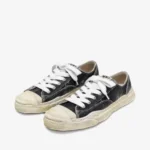 Front view of Maison Mihara Yasuhiro Canvas Low-Top Sneakers