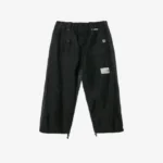 Front view of panelled cargo track trousers with utility-inspired pocket detailing