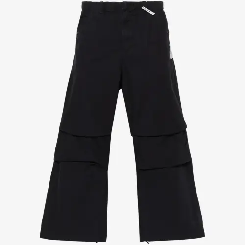Front view of Maison Mihara Yasuhiro Wide-Leg Cotton Trousers highlighting their relaxed silhouette.
